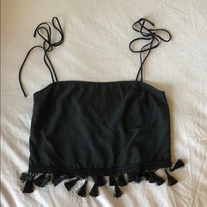 Black thank with tassels